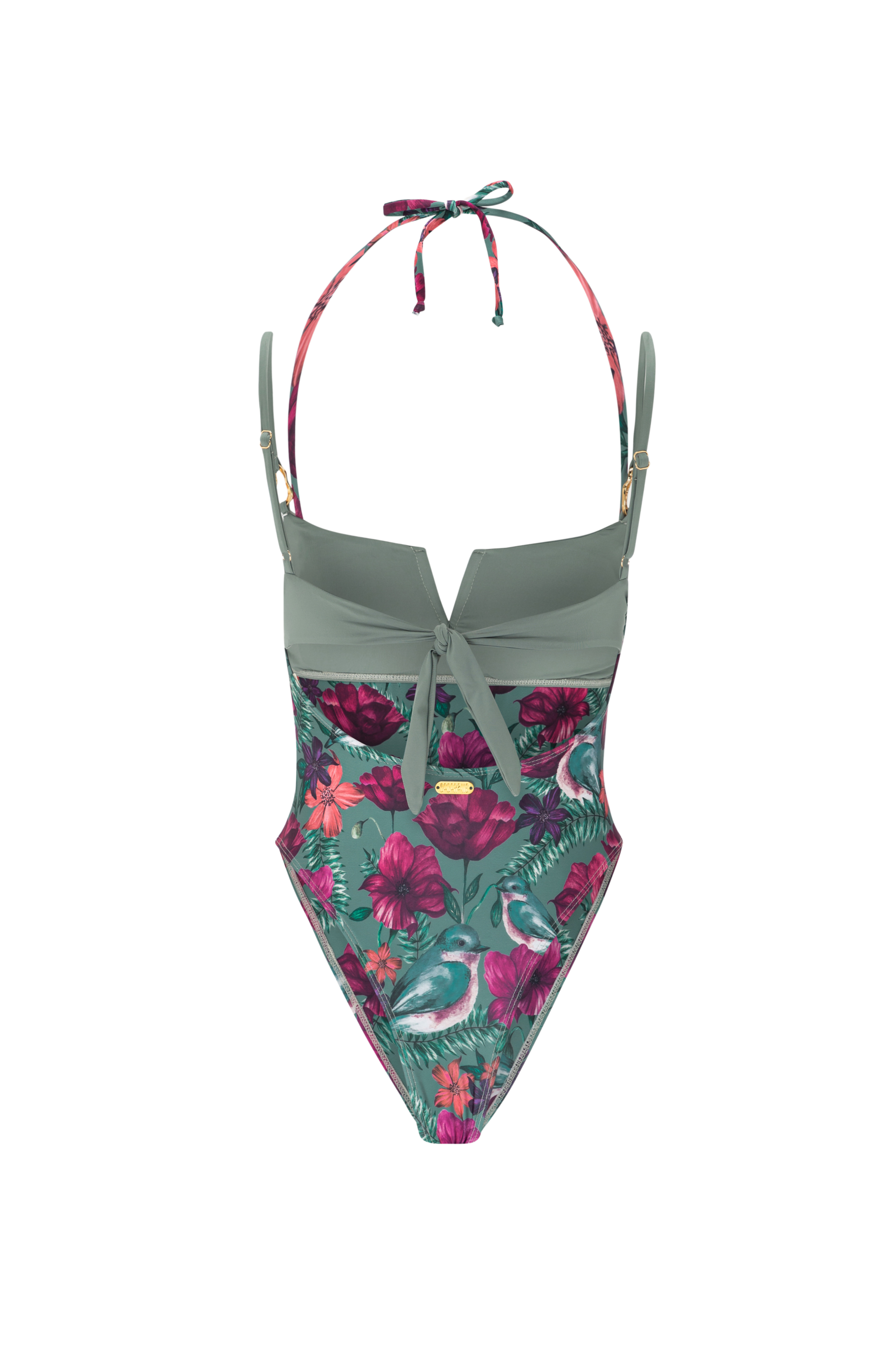 Designer goddess one-piece photographed for resort escape